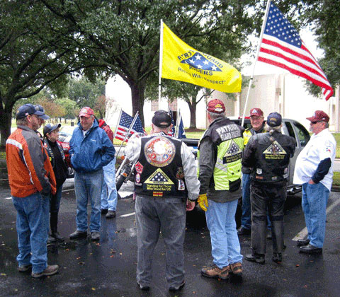 Patriot Guard members gathered at a mission